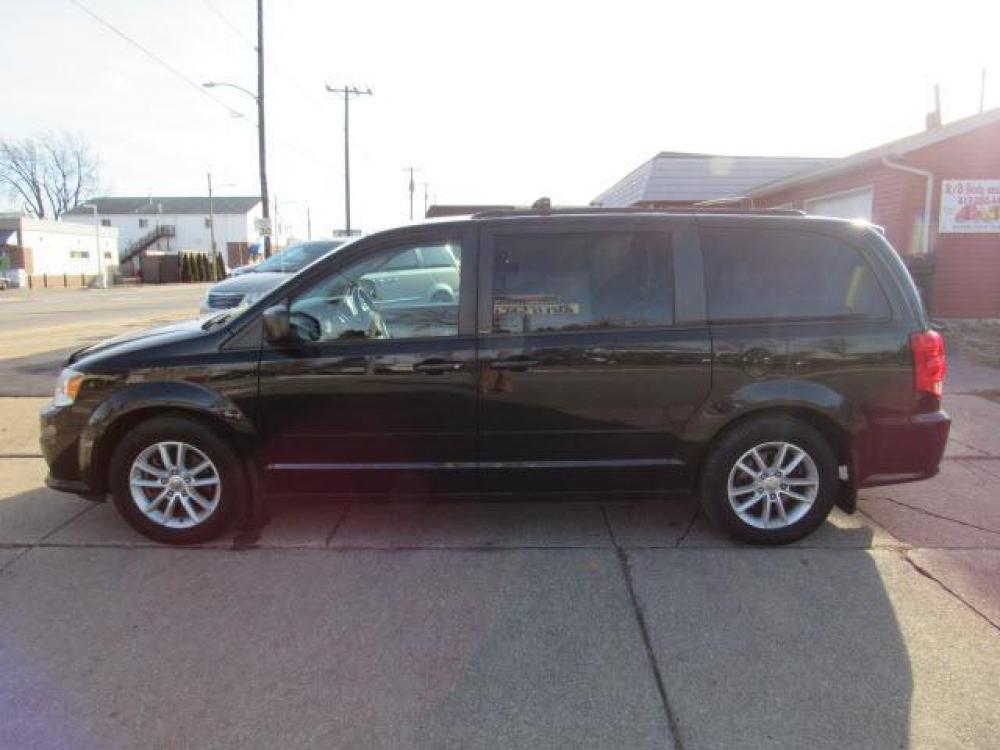 2014 Brilliant Black Crystal Pearl Coat Dodge Grand Caravan SE (2C4RDGBG8ER) with an 3.6 6 Cylinder Sequential Multiport Fuel Injection engine, 6-Speed Shiftable Automatic transmission, located at 5505 N. Summit St., Toledo, OH, 43611, (419) 729-2688, 41.654953, -83.530014 - Photo #20