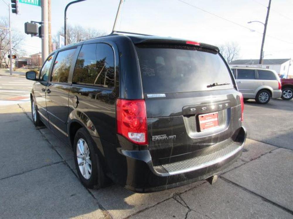 2014 Brilliant Black Crystal Pearl Coat Dodge Grand Caravan SE (2C4RDGBG8ER) with an 3.6 6 Cylinder Sequential Multiport Fuel Injection engine, 6-Speed Shiftable Automatic transmission, located at 5505 N. Summit St., Toledo, OH, 43611, (419) 729-2688, 41.654953, -83.530014 - Photo #21