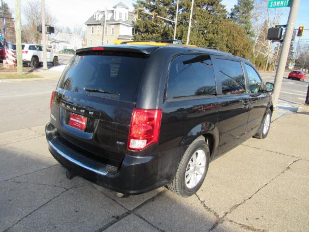 2014 Brilliant Black Crystal Pearl Coat Dodge Grand Caravan SE (2C4RDGBG8ER) with an 3.6 6 Cylinder Sequential Multiport Fuel Injection engine, 6-Speed Shiftable Automatic transmission, located at 5505 N. Summit St., Toledo, OH, 43611, (419) 729-2688, 41.654953, -83.530014 - Photo #23
