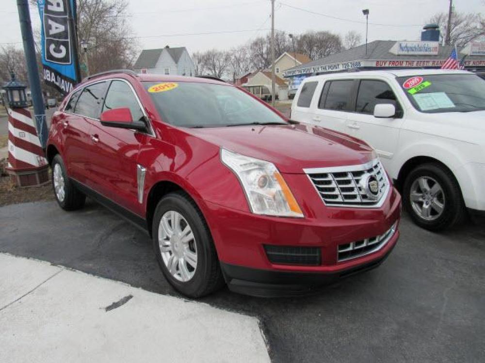 2013 Crystal Red Tintcoat Cadillac SRX Base (3GYFNAE37DS) with an 3.6 6 Cylinder Direct Injection engine, 6-Speed Shiftable Automatic transmission, located at 5505 N. Summit St., Toledo, OH, 43611, (419) 729-2688, 41.654953, -83.530014 - Photo #17