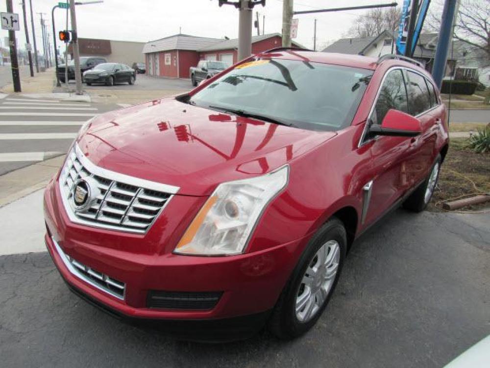 2013 Crystal Red Tintcoat Cadillac SRX Base (3GYFNAE37DS) with an 3.6 6 Cylinder Direct Injection engine, 6-Speed Shiftable Automatic transmission, located at 5505 N. Summit St., Toledo, OH, 43611, (419) 729-2688, 41.654953, -83.530014 - Photo #19