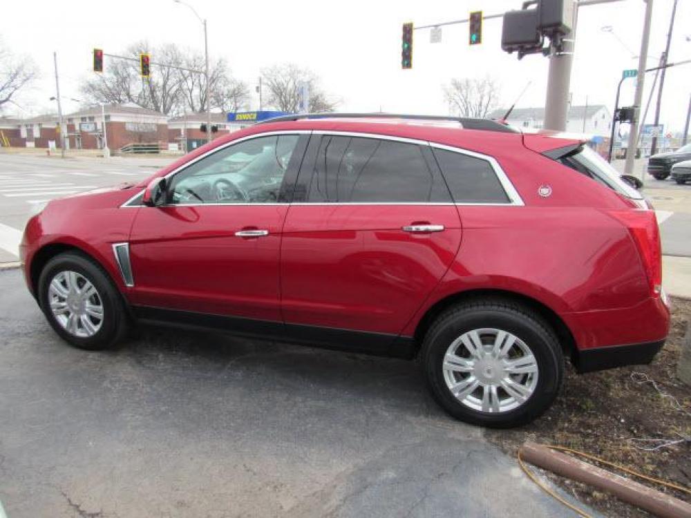 2013 Crystal Red Tintcoat Cadillac SRX Base (3GYFNAE37DS) with an 3.6 6 Cylinder Direct Injection engine, 6-Speed Shiftable Automatic transmission, located at 5505 N. Summit St., Toledo, OH, 43611, (419) 729-2688, 41.654953, -83.530014 - Photo #20
