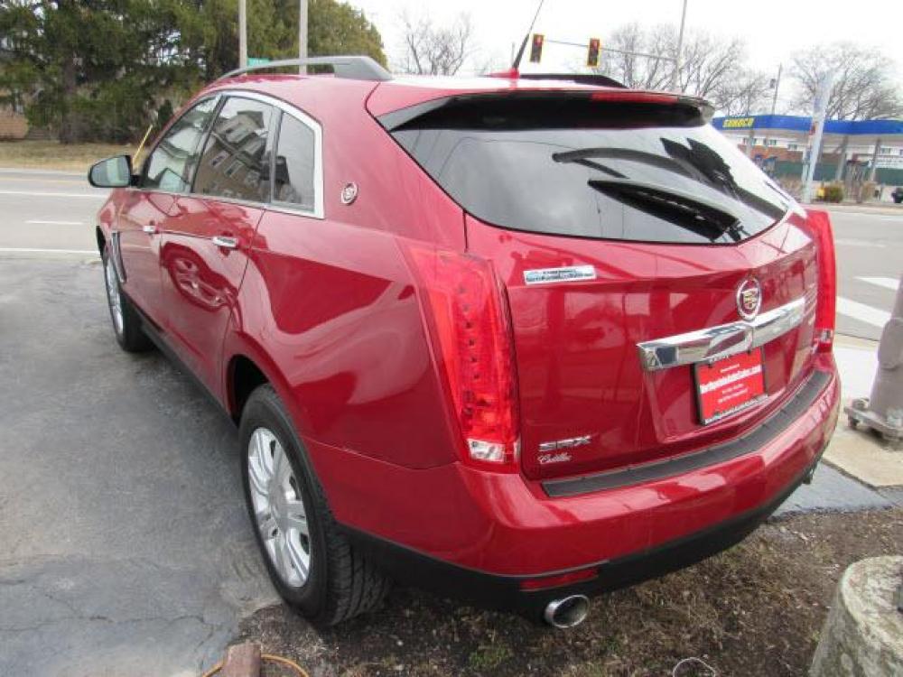 2013 Crystal Red Tintcoat Cadillac SRX Base (3GYFNAE37DS) with an 3.6 6 Cylinder Direct Injection engine, 6-Speed Shiftable Automatic transmission, located at 5505 N. Summit St., Toledo, OH, 43611, (419) 729-2688, 41.654953, -83.530014 - Photo #21