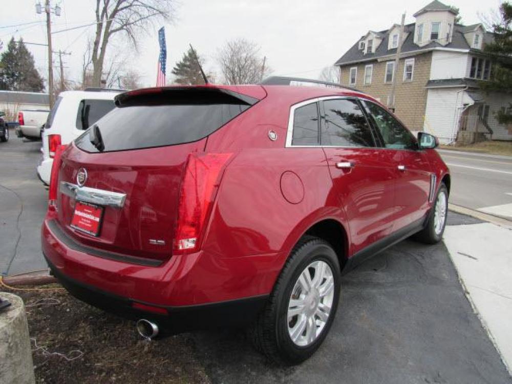 2013 Crystal Red Tintcoat Cadillac SRX Base (3GYFNAE37DS) with an 3.6 6 Cylinder Direct Injection engine, 6-Speed Shiftable Automatic transmission, located at 5505 N. Summit St., Toledo, OH, 43611, (419) 729-2688, 41.654953, -83.530014 - Photo #22