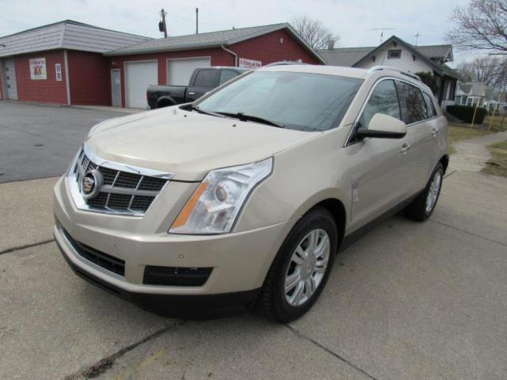 2012 Gold Mist Metallic Cadillac SRX Luxury Collection AWD (3GYFNDE35CS) with an 3.6 6 Cylinder Direct Injection engine, 6-Speed Shiftable Automatic transmission, located at 5505 N. Summit St., Toledo, OH, 43611, (419) 729-2688, 41.654953, -83.530014 - Photo #21