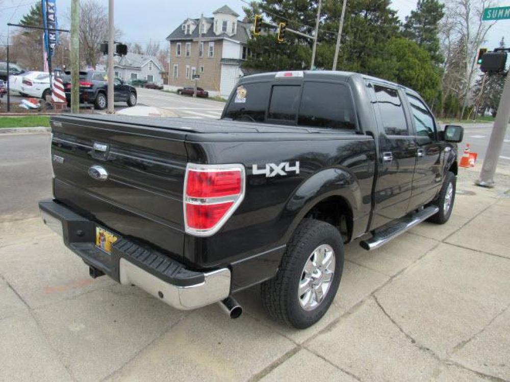 2013 Tuxedo Black Metallic Ford F-150 XLT 4X4 (1FTFW1ET3DF) with an 3.5 6 Cylinder Direct Injection engine, 6-Speed Automatic transmission, located at 5505 N. Summit St., Toledo, OH, 43611, (419) 729-2688, 41.654953, -83.530014 - Photo #21
