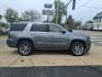 2019 Quicksilver Metallic Gan GMC Yukon Denali (1GKS2CKJ6KR) with an 6.2L EcoTec3 6.2L V8 420hp 460ft. lbs. Direct Injection engine, 10-Speed Shiftable Automatic transmission, located at 5505 N. Summit St., Toledo, OH, 43611, (419) 729-2688, 41.654953, -83.530014 - Photo#0