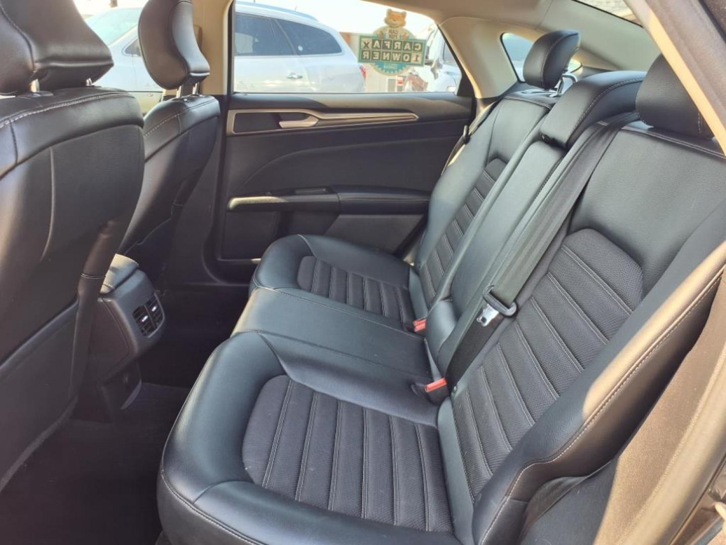 2017 Magnetic Ford Fusion SE (3FA6P0HD3HR) with an 1.5L EcoBoost 1.5L Turbo I4 181hp 185ft. lbs. Direct Injection engine, 6-Speed Shiftable Automatic transmission, located at 5505 N. Summit St., Toledo, OH, 43611, (419) 729-2688, 41.654953, -83.530014 - Photo#3