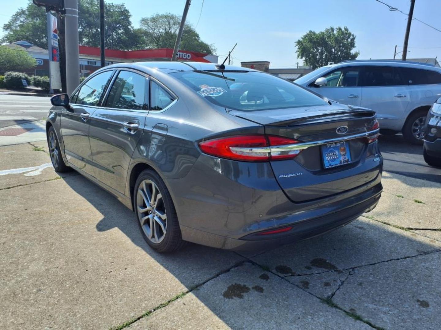 2017 Magnetic Ford Fusion SE (3FA6P0HD3HR) with an 1.5L EcoBoost 1.5L Turbo I4 181hp 185ft. lbs. Direct Injection engine, 6-Speed Shiftable Automatic transmission, located at 5505 N. Summit St., Toledo, OH, 43611, (419) 729-2688, 41.654953, -83.530014 - Photo#19