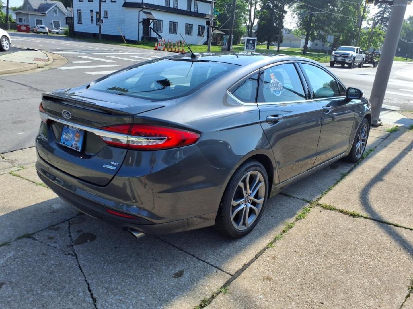 2017 Magnetic Ford Fusion SE (3FA6P0HD3HR) with an 1.5L EcoBoost 1.5L Turbo I4 181hp 185ft. lbs. Direct Injection engine, 6-Speed Shiftable Automatic transmission, located at 5505 N. Summit St., Toledo, OH, 43611, (419) 729-2688, 41.654953, -83.530014 - Photo#21