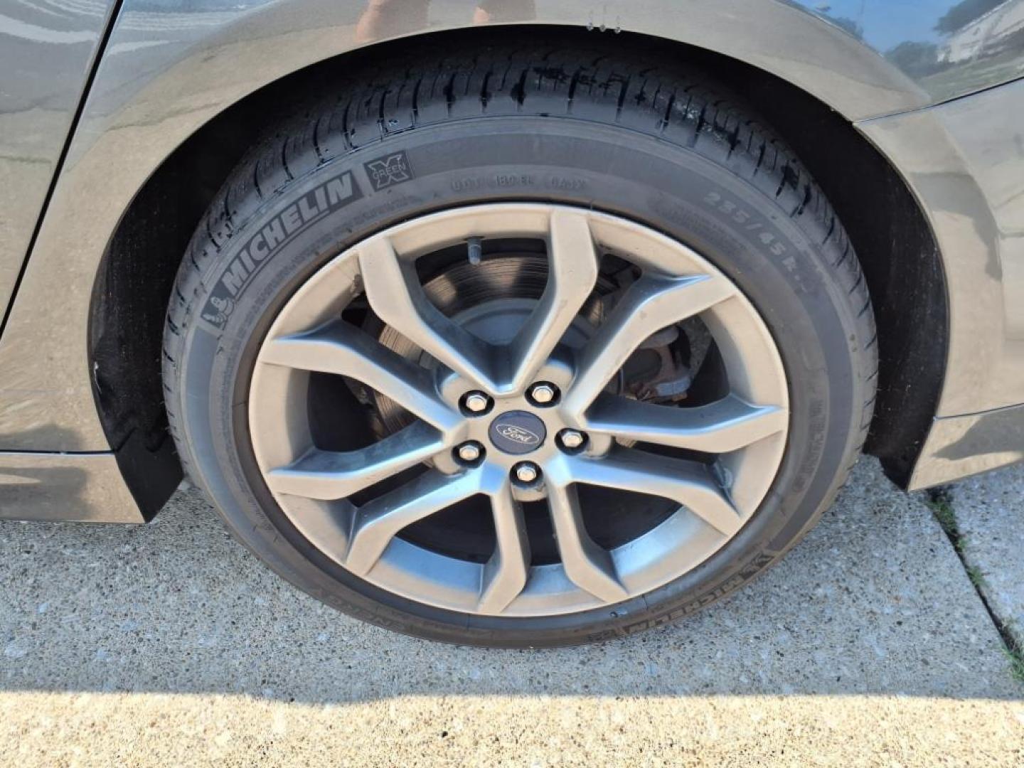 2017 Magnetic Ford Fusion SE (3FA6P0HD3HR) with an 1.5L EcoBoost 1.5L Turbo I4 181hp 185ft. lbs. Direct Injection engine, 6-Speed Shiftable Automatic transmission, located at 5505 N. Summit St., Toledo, OH, 43611, (419) 729-2688, 41.654953, -83.530014 - Photo#25