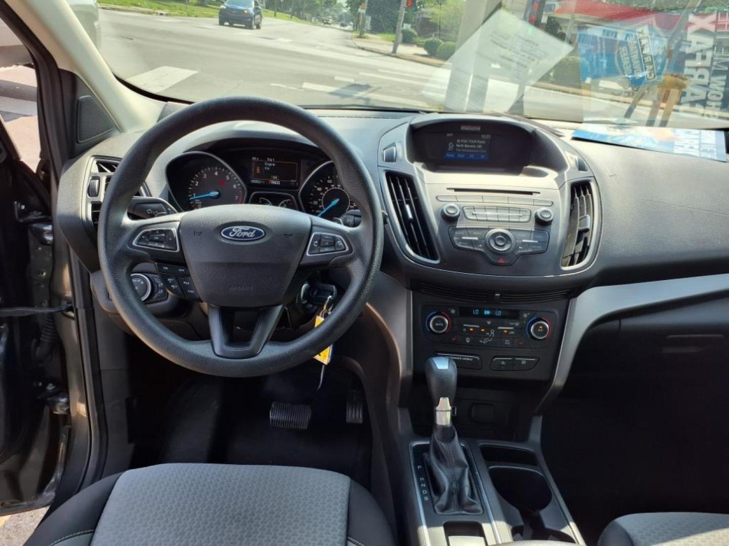 2017 Magnetic Ford Escape SE (1FMCU0GD2HU) with an 1.5L EcoBoost 1.5L Turbo I4 179hp 177ft. lbs. Direct Injection engine, 6-Speed Shiftable Automatic transmission, located at 5505 N. Summit St., Toledo, OH, 43611, (419) 729-2688, 41.654953, -83.530014 - Photo#3