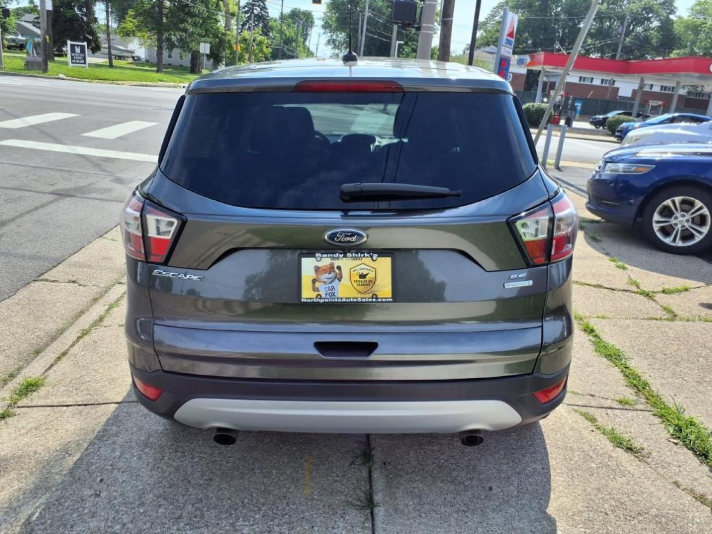 2017 Magnetic Ford Escape SE (1FMCU0GD2HU) with an 1.5L EcoBoost 1.5L Turbo I4 179hp 177ft. lbs. Direct Injection engine, 6-Speed Shiftable Automatic transmission, located at 5505 N. Summit St., Toledo, OH, 43611, (419) 729-2688, 41.654953, -83.530014 - Photo#21