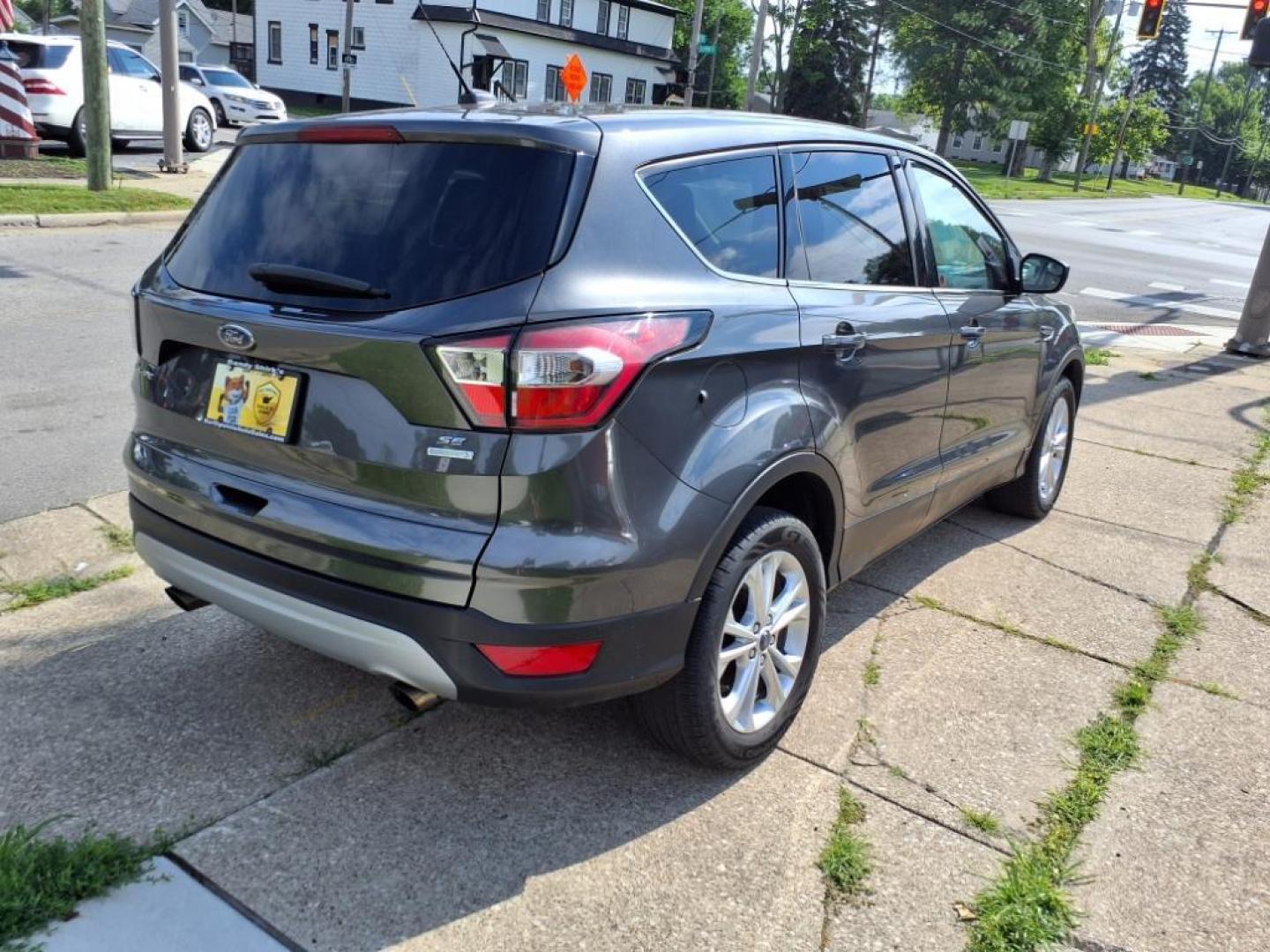 2017 Magnetic Ford Escape SE (1FMCU0GD2HU) with an 1.5L EcoBoost 1.5L Turbo I4 179hp 177ft. lbs. Direct Injection engine, 6-Speed Shiftable Automatic transmission, located at 5505 N. Summit St., Toledo, OH, 43611, (419) 729-2688, 41.654953, -83.530014 - Photo#22