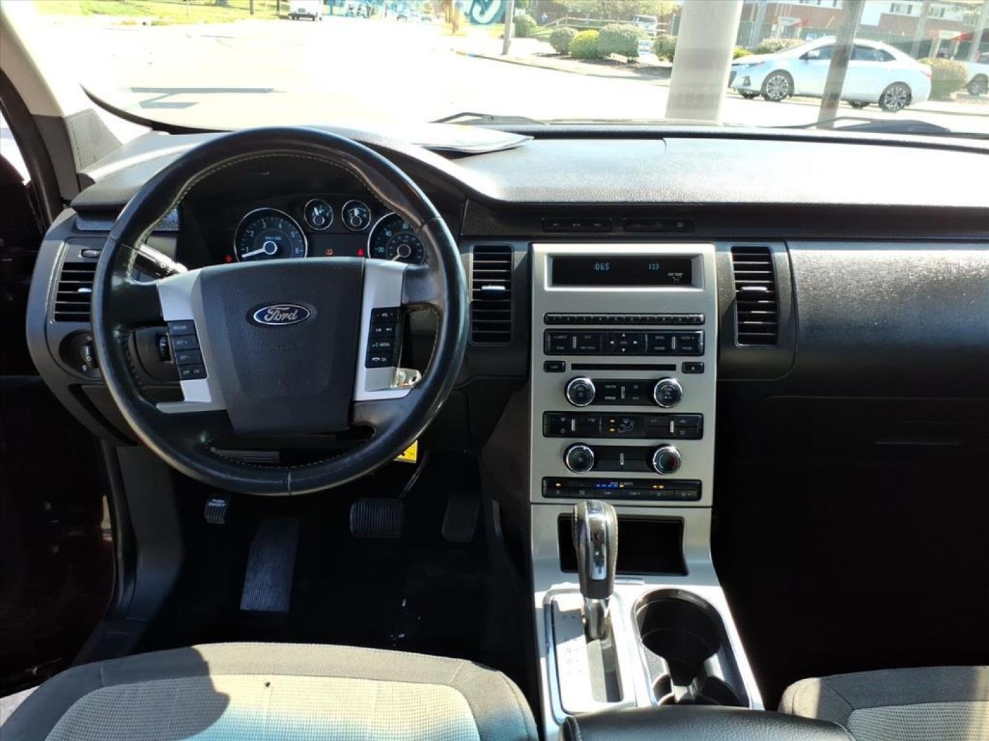 2011 Bordeaux Reserve Metallic Red Ford Flex SE (2FMGK5BC9BB) with an 3.5L 3.5L V6 262hp 248ft. lbs. Sequential Multiport Fuel Injection engine, 6-Speed Automatic transmission, located at 5505 N. Summit St., Toledo, OH, 43611, (419) 729-2688, 41.654953, -83.530014 - Photo#6