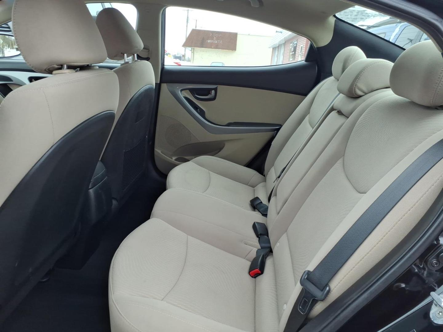 2015 Black Diamond Hyundai ELANTRA SE (5NPDH4AE6FH) with an 1.8L 1.8L I4 145hp 130ft. lbs. Sequential Multiport Fuel Injection engine, 6-Speed Shiftable Automatic transmission, located at 5505 N. Summit St., Toledo, OH, 43611, (419) 729-2688, 41.654953, -83.530014 - Photo#2