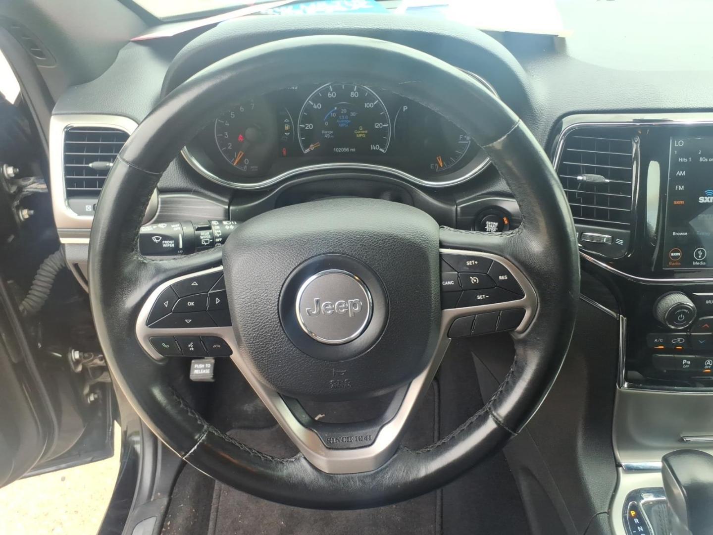 2019 Diamond Black Crystal Pearl Coat Pxj Jeep Grand Cherokee Limited (1C4RJFBGXKC) with an 3.6L Pentastar 3.6L V6 295hp 260ft. lbs. Sequential Multiport Fuel Injection engine, 8-Speed Shiftable Automatic transmission, located at 5505 N. Summit St., Toledo, OH, 43611, (419) 729-2688, 41.654953, -83.530014 - Photo#4