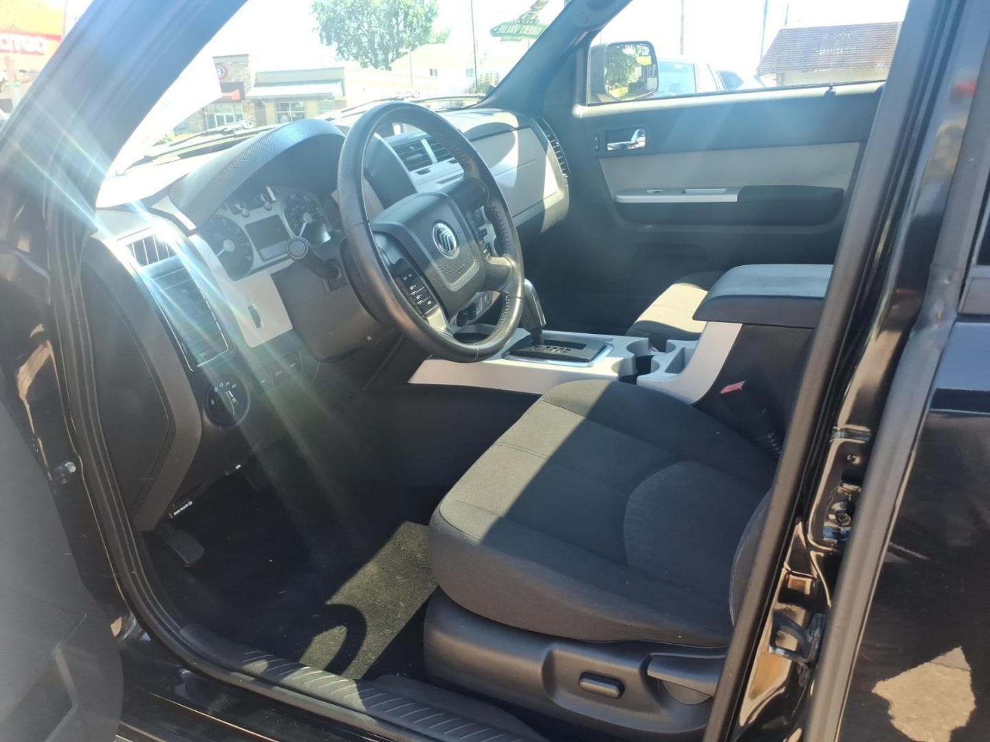2010 Black Mercury Mariner I4 (4M2CN8B78AK) with an Duratec 2.5L I4 171hp 171ft. lbs. Sequential Multiport Fuel Injection engine, 6-Speed Automatic transmission, located at 5505 N. Summit St., Toledo, OH, 43611, (419) 729-2688, 41.654953, -83.530014 - Photo#1