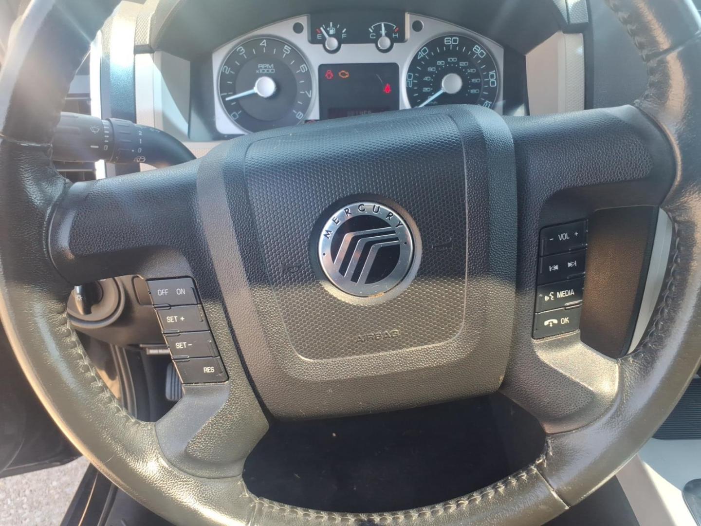 2010 Black Mercury Mariner I4 (4M2CN8B78AK) with an Duratec 2.5L I4 171hp 171ft. lbs. Sequential Multiport Fuel Injection engine, 6-Speed Automatic transmission, located at 5505 N. Summit St., Toledo, OH, 43611, (419) 729-2688, 41.654953, -83.530014 - Photo#5