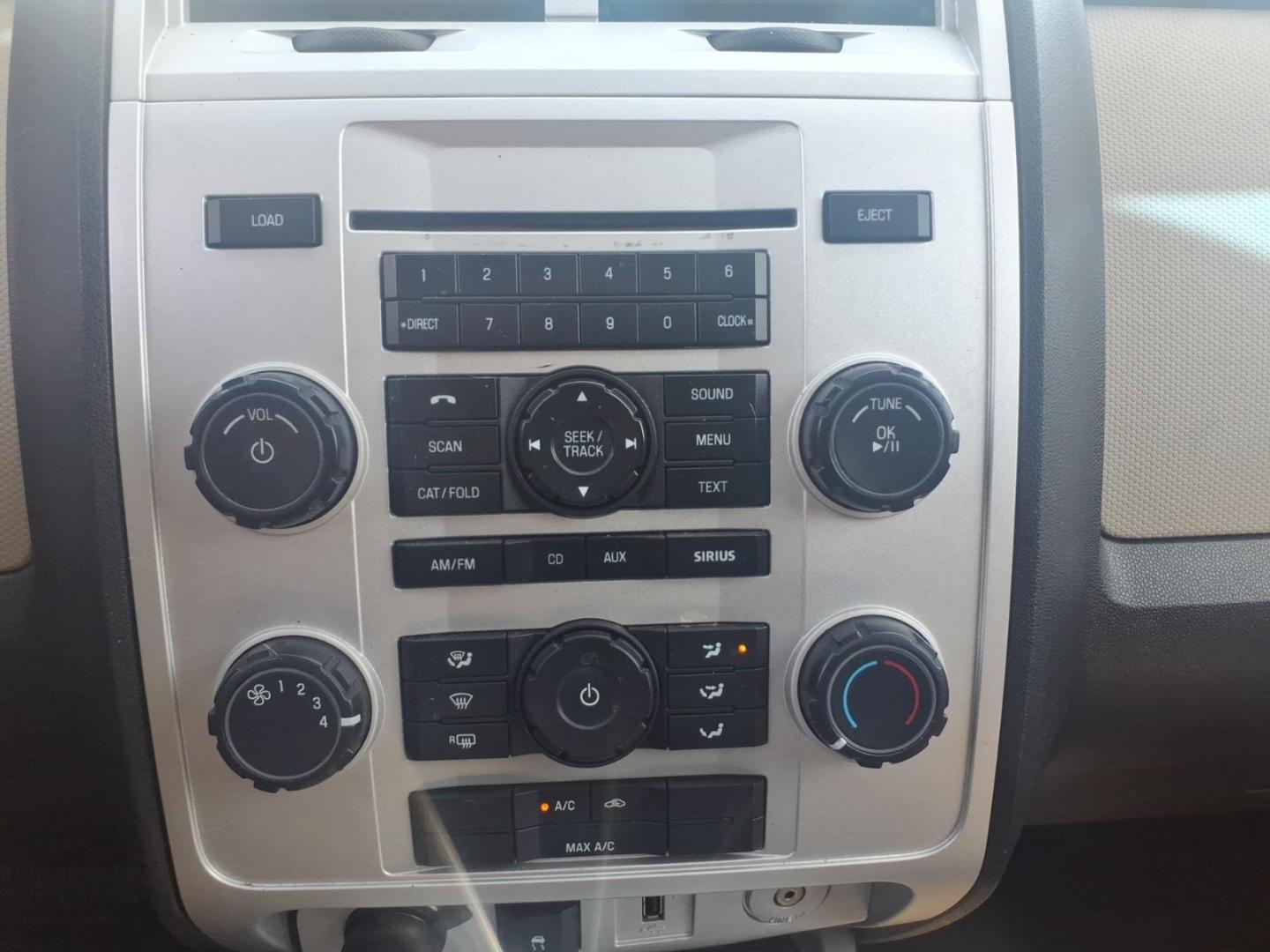 2010 Black Mercury Mariner I4 (4M2CN8B78AK) with an Duratec 2.5L I4 171hp 171ft. lbs. Sequential Multiport Fuel Injection engine, 6-Speed Automatic transmission, located at 5505 N. Summit St., Toledo, OH, 43611, (419) 729-2688, 41.654953, -83.530014 - Photo#9