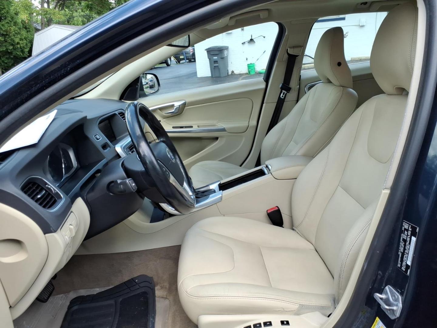 2015 Caspian Blue Metallic Volvo V60 T5 Platinum (YV1612SD1F1) with an 2.5L 2.5L Turbo I5 250hp 266ft. lbs. ULEV Direct Injection engine, 6-Speed Shiftable Automatic transmission, located at 5505 N. Summit St., Toledo, OH, 43611, (419) 729-2688, 41.654953, -83.530014 - Photo#1