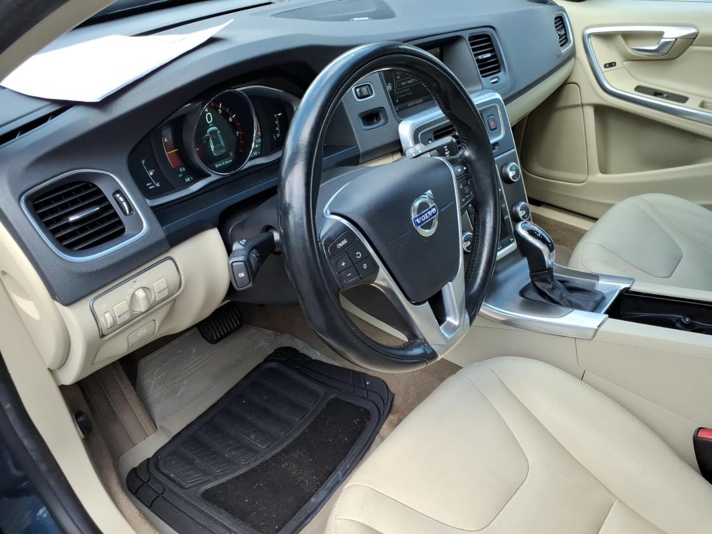 2015 Caspian Blue Metallic Volvo V60 T5 Platinum (YV1612SD1F1) with an 2.5L 2.5L Turbo I5 250hp 266ft. lbs. ULEV Direct Injection engine, 6-Speed Shiftable Automatic transmission, located at 5505 N. Summit St., Toledo, OH, 43611, (419) 729-2688, 41.654953, -83.530014 - Photo#2