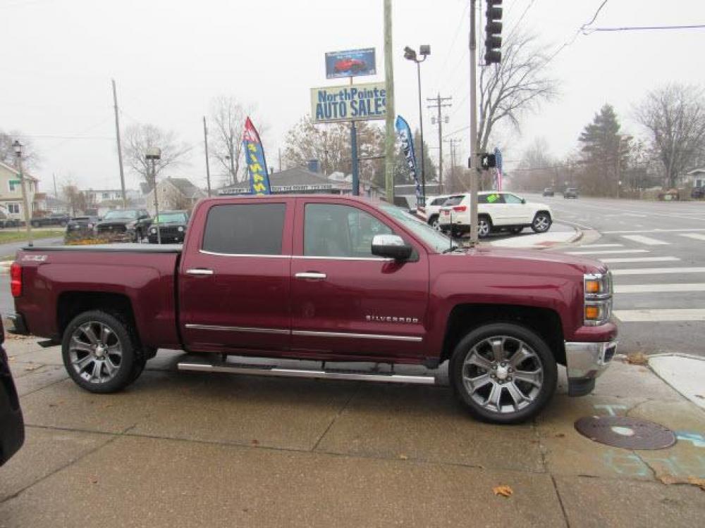 2015 Deep Ruby Metallic Chevrolet Silverado 1500 LTZ Z71 4X4 (3GCUKSEC0FG) with an 5.3 8 Cylinder Direct Injection engine, 6-Speed Shiftable Automatic transmission, located at 5505 N. Summit St., Toledo, OH, 43611, (419) 729-2688, 41.654953, -83.530014 - Photo #0