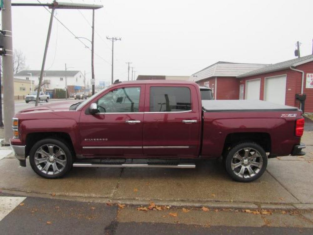 2015 Deep Ruby Metallic Chevrolet Silverado 1500 LTZ Z71 4X4 (3GCUKSEC0FG) with an 5.3 8 Cylinder Direct Injection engine, 6-Speed Shiftable Automatic transmission, located at 5505 N. Summit St., Toledo, OH, 43611, (419) 729-2688, 41.654953, -83.530014 - Photo #23