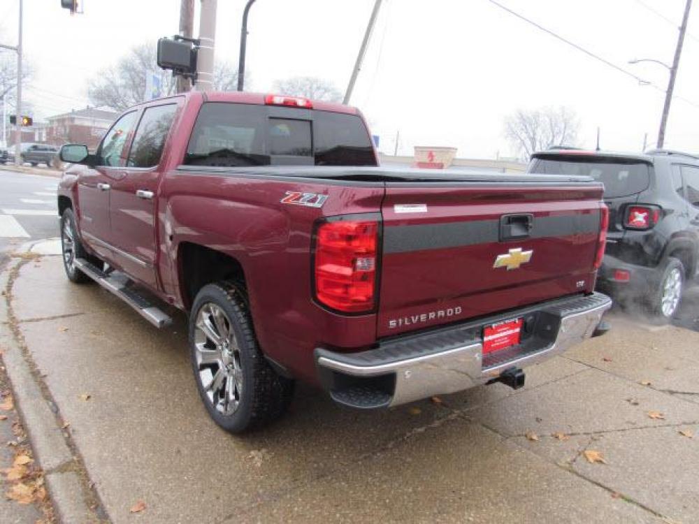 2015 Deep Ruby Metallic Chevrolet Silverado 1500 LTZ Z71 4X4 (3GCUKSEC0FG) with an 5.3 8 Cylinder Direct Injection engine, 6-Speed Shiftable Automatic transmission, located at 5505 N. Summit St., Toledo, OH, 43611, (419) 729-2688, 41.654953, -83.530014 - Photo #24