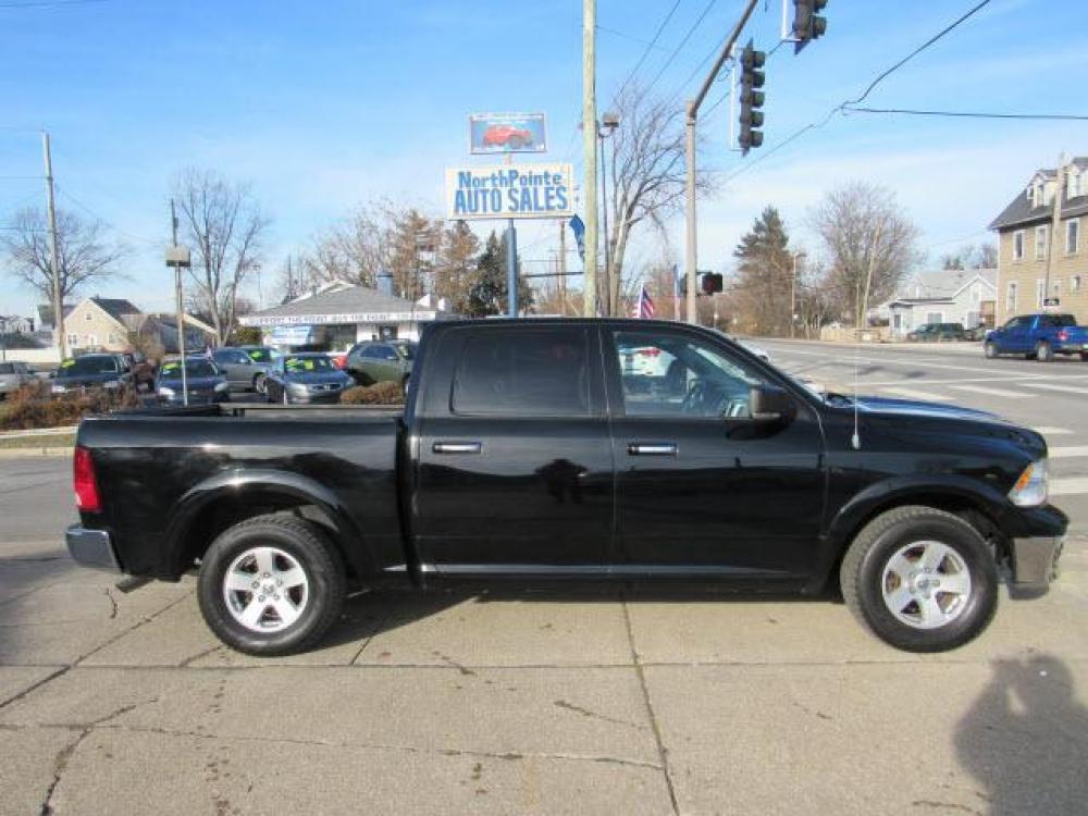 2012 Black Clear Coat RAM 1500 SLT 4X4 (1C6RD7LT1CS) with an 5.7 8 Cylinder Sequential Multiport Fuel Injection engine, 6-Speed Automatic transmission, located at 5505 N. Summit St., Toledo, OH, 43611, (419) 729-2688, 41.654953, -83.530014 - Photo #0