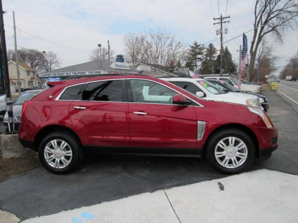 2013 Crystal Red Tintcoat Cadillac SRX Base (3GYFNAE37DS) with an 3.6 6 Cylinder Direct Injection engine, 6-Speed Shiftable Automatic transmission, located at 5505 N. Summit St., Toledo, OH, 43611, (419) 729-2688, 41.654953, -83.530014 - Photo #0