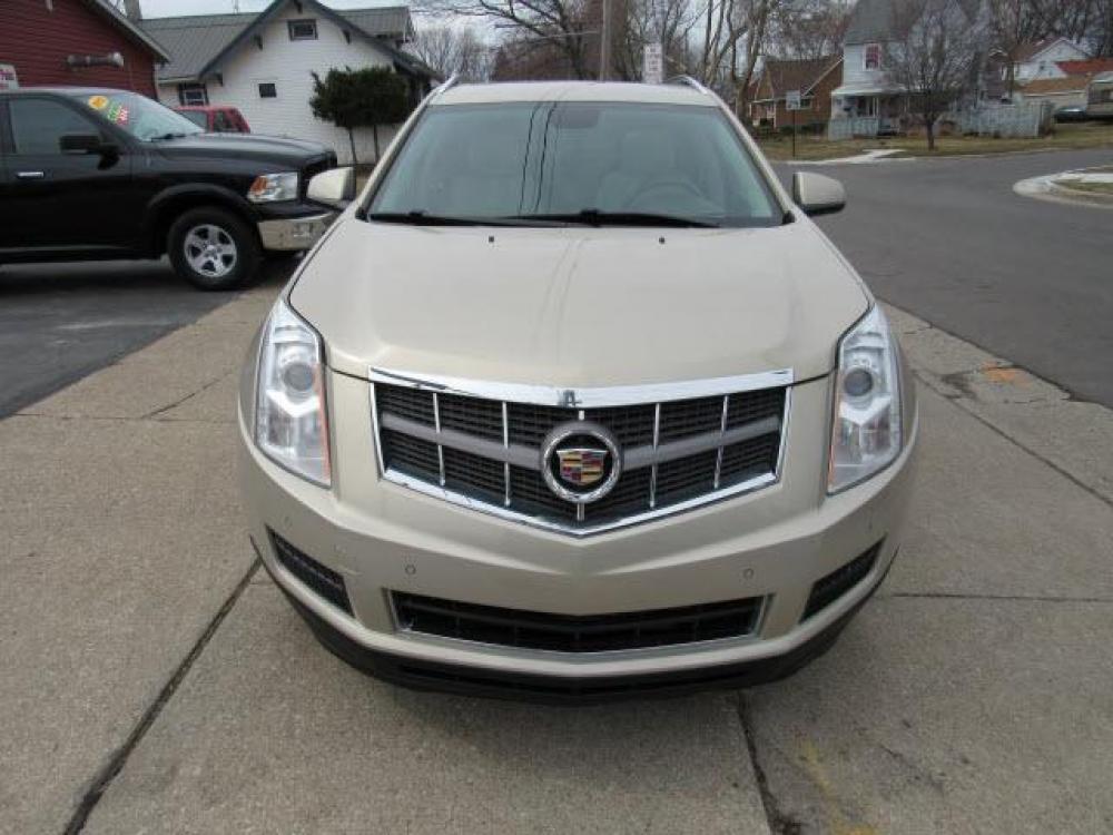 2012 Gold Mist Metallic Cadillac SRX Luxury Collection AWD (3GYFNDE35CS) with an 3.6 6 Cylinder Direct Injection engine, 6-Speed Shiftable Automatic transmission, located at 5505 N. Summit St., Toledo, OH, 43611, (419) 729-2688, 41.654953, -83.530014 - Photo #20