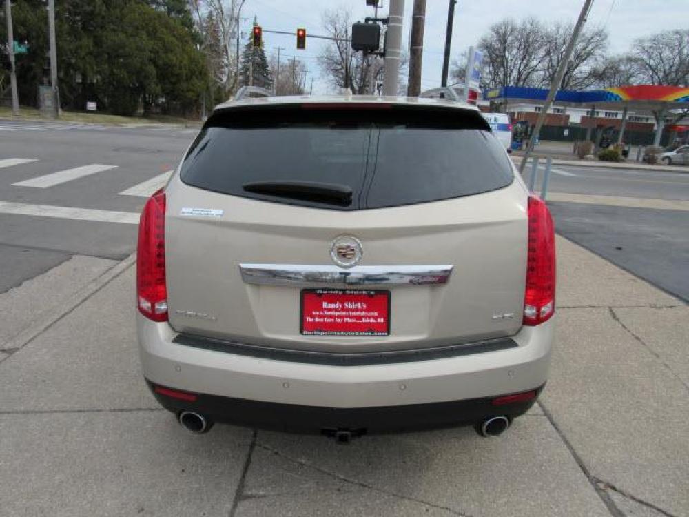2012 Gold Mist Metallic Cadillac SRX Luxury Collection AWD (3GYFNDE35CS) with an 3.6 6 Cylinder Direct Injection engine, 6-Speed Shiftable Automatic transmission, located at 5505 N. Summit St., Toledo, OH, 43611, (419) 729-2688, 41.654953, -83.530014 - Photo #24