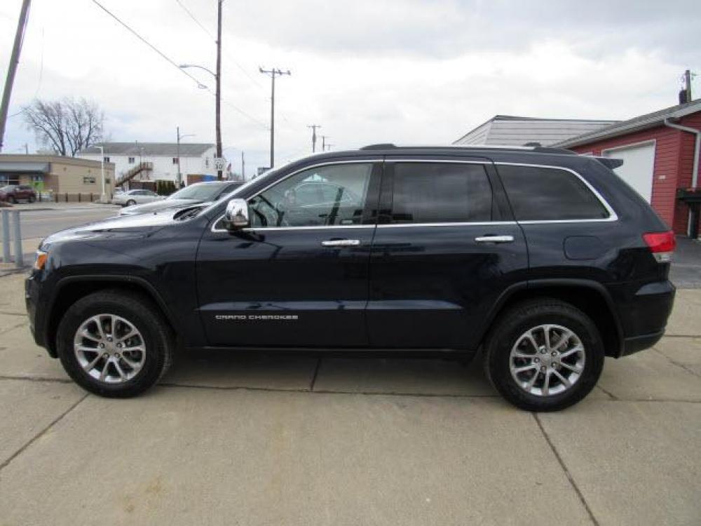 2015 True Blue Pearl Coat Jeep Grand Cherokee Limited 4X4 (1C4RJFBG5FC) with an 3.6 6 Cylinder Sequential Multiport Fuel Injection engine, 8-Speed Shiftable Automatic transmission, located at 5505 N. Summit St., Toledo, OH, 43611, (419) 729-2688, 41.654953, -83.530014 - Photo #22