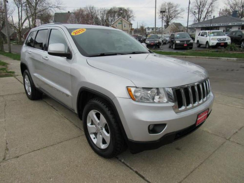 2012 Bright Silver Metallic Clear Coat Jeep Grand Cherokee Laredo 4X4 (1C4RJFAG6CC) with an 3.6 6 Cylinder Sequential Multiport Fuel Injection engine, 5-Speed Automatic transmission, located at 5505 N. Summit St., Toledo, OH, 43611, (419) 729-2688, 41.654953, -83.530014 - Photo #19