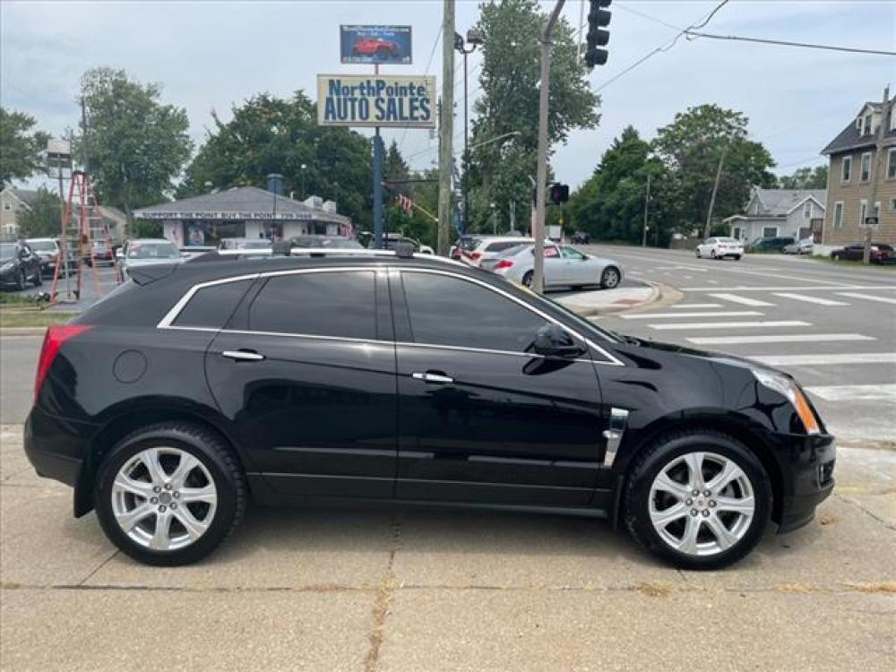 2010 Black Raven Cadillac SRX Turbo Premium Collection 4WD (3GYFNFE42AS) with an 2.8 6 Cylinder Fuel Injected engine, 6-Speed Shiftable Automatic transmission, located at 5505 N. Summit St., Toledo, OH, 43611, (419) 729-2688, 41.654953, -83.530014 - Photo #0