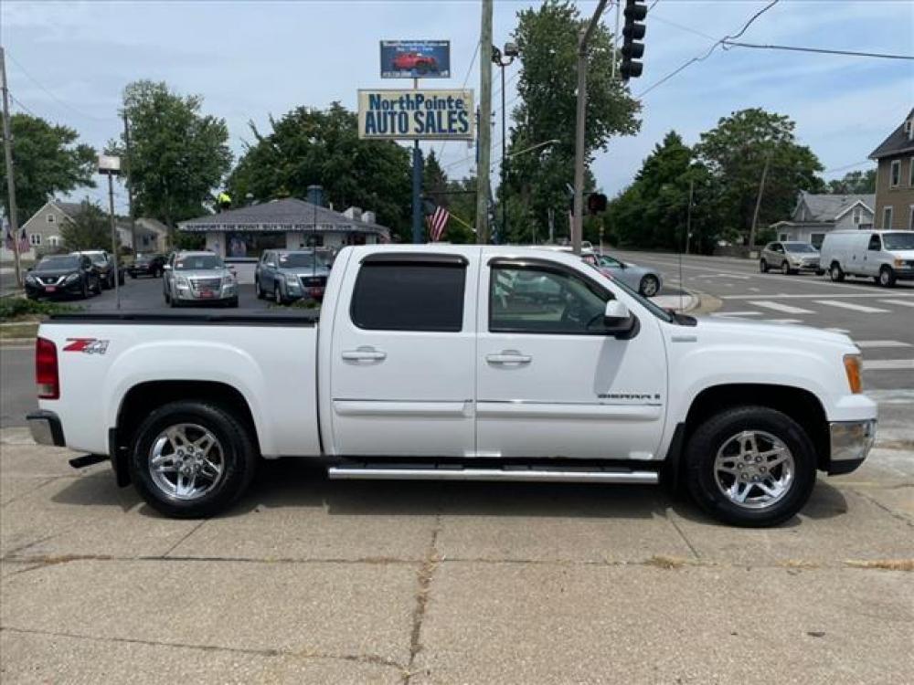 2009 Summit White GMC Sierra 1500 SLE 4X4 (3GTEK13M79G) with an 5.3 8 Cylinder Fuel Injected engine, 6-Speed Shiftable Automatic transmission, located at 5505 N. Summit St., Toledo, OH, 43611, (419) 729-2688, 41.654953, -83.530014 - Photo #0