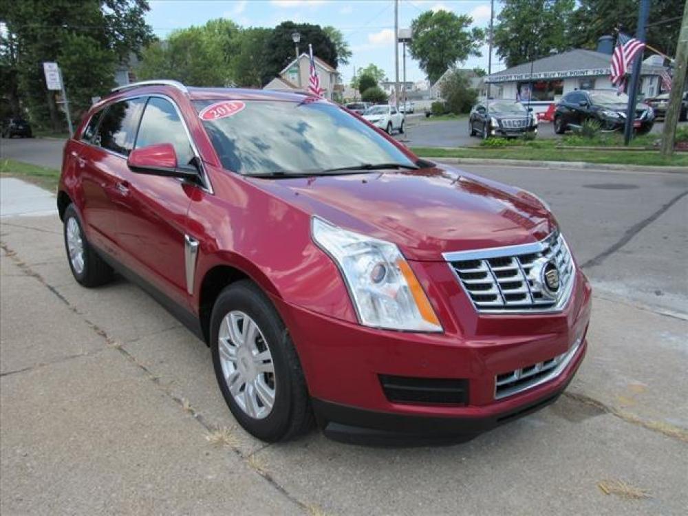 2013 Crystal Red Tintcoat Cadillac SRX Luxury Collection (3GYFNCE36DS) with an 3.6 6 Cylinder Direct Injection engine, 6-Speed Shiftable Automatic transmission, located at 5505 N. Summit St., Toledo, OH, 43611, (419) 729-2688, 41.654953, -83.530014 - Photo #19