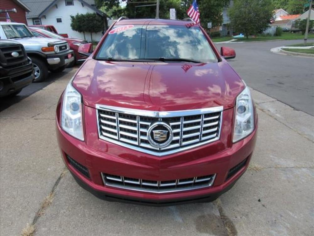 2013 Crystal Red Tintcoat Cadillac SRX Luxury Collection (3GYFNCE36DS) with an 3.6 6 Cylinder Direct Injection engine, 6-Speed Shiftable Automatic transmission, located at 5505 N. Summit St., Toledo, OH, 43611, (419) 729-2688, 41.654953, -83.530014 - Photo #20