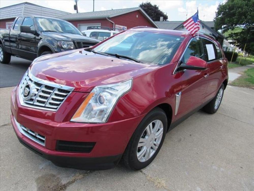2013 Crystal Red Tintcoat Cadillac SRX Luxury Collection (3GYFNCE36DS) with an 3.6 6 Cylinder Direct Injection engine, 6-Speed Shiftable Automatic transmission, located at 5505 N. Summit St., Toledo, OH, 43611, (419) 729-2688, 41.654953, -83.530014 - Photo #21