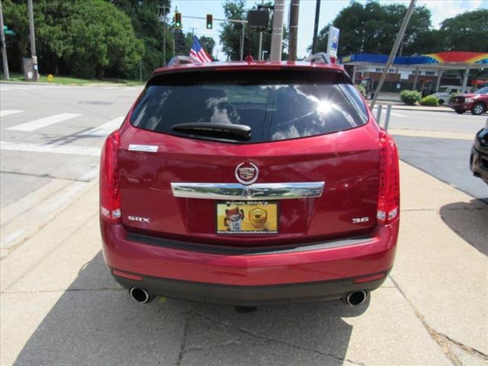 2013 Crystal Red Tintcoat Cadillac SRX Luxury Collection (3GYFNCE36DS) with an 3.6 6 Cylinder Direct Injection engine, 6-Speed Shiftable Automatic transmission, located at 5505 N. Summit St., Toledo, OH, 43611, (419) 729-2688, 41.654953, -83.530014 - Photo #24