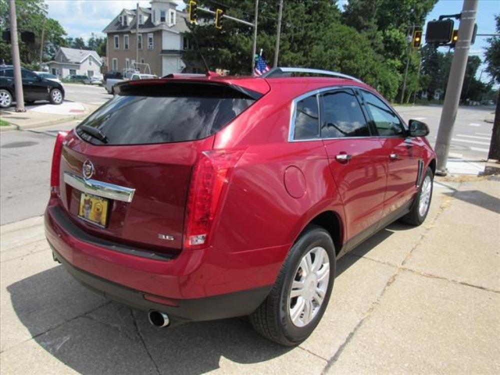 2013 Crystal Red Tintcoat Cadillac SRX Luxury Collection (3GYFNCE36DS) with an 3.6 6 Cylinder Direct Injection engine, 6-Speed Shiftable Automatic transmission, located at 5505 N. Summit St., Toledo, OH, 43611, (419) 729-2688, 41.654953, -83.530014 - Photo #25