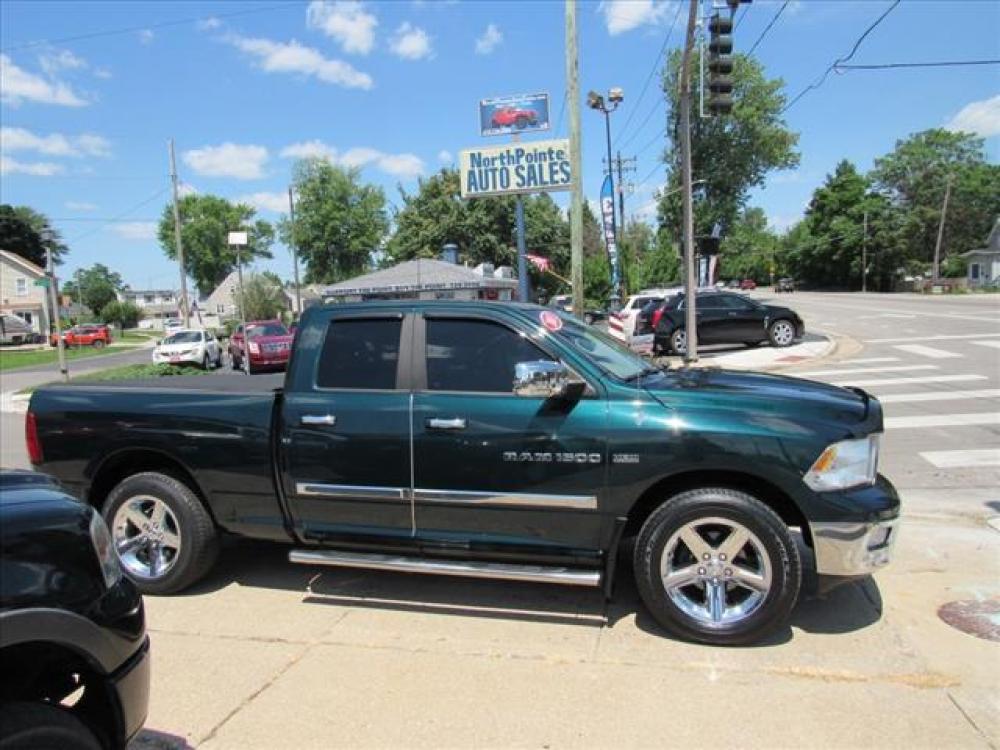 2011 Hunter Green Pearl Coat RAM 1500 ST 4X4 (1D7RV1GT9BS) with an 5.7 8 Cylinder Sequential Multiport Fuel Injection engine, 5-Speed Automatic transmission, located at 5505 N. Summit St., Toledo, OH, 43611, (419) 729-2688, 41.654953, -83.530014 - Photo #0