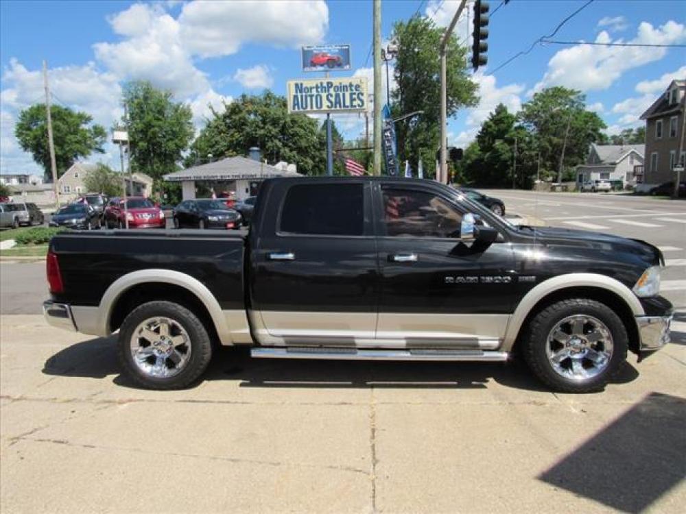 2011 Brilliant Black Crystal Pearl Coat/White Gold Clea RAM 1500 Laramie 4X4 (1D7RV1CT1BS) with an 5.7 8 Cylinder Sequential Multiport Fuel Injection engine, 5-Speed Automatic transmission, located at 5505 N. Summit St., Toledo, OH, 43611, (419) 729-2688, 41.654953, -83.530014 - Photo #0