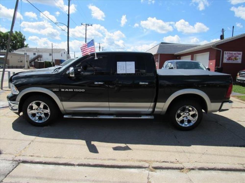 2011 Brilliant Black Crystal Pearl Coat/White Gold Clea RAM 1500 Laramie 4X4 (1D7RV1CT1BS) with an 5.7 8 Cylinder Sequential Multiport Fuel Injection engine, 5-Speed Automatic transmission, located at 5505 N. Summit St., Toledo, OH, 43611, (419) 729-2688, 41.654953, -83.530014 - Photo #20