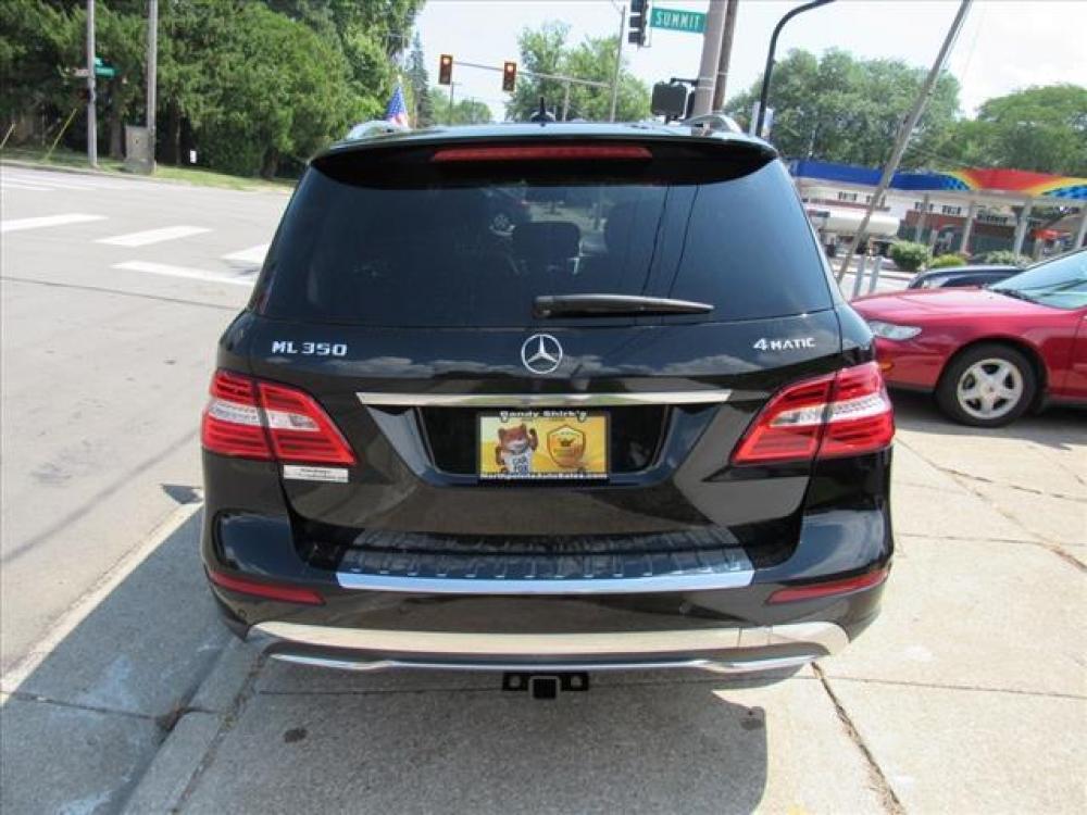 2013 Black Mercedes-Benz M-Class ML 350 4MATIC (4JGDA5HB8DA) with an 3.5 6 Cylinder Direct Injection engine, 7-Speed Shiftable Automatic transmission, located at 5505 N. Summit St., Toledo, OH, 43611, (419) 729-2688, 41.654953, -83.530014 - Photo #24
