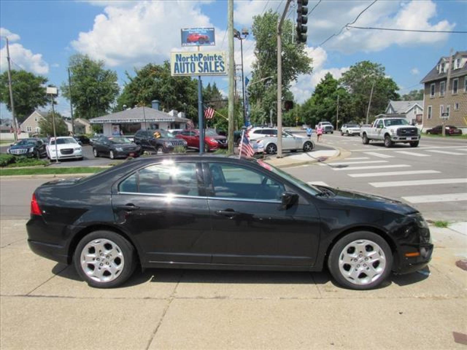 2011 Tuxedo Black Metallic Ford Fusion SE (3FAHP0HA3BR) with an 2.5 4 Cylinder Sequential Multiport Fuel Injection engine, 6-Speed Manual transmission, located at 5505 N. Summit St., Toledo, OH, 43611, (419) 729-2688, 41.654953, -83.530014 - Photo #0