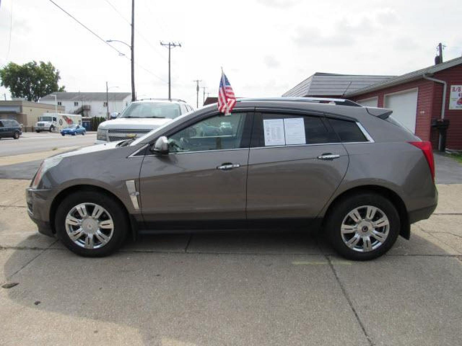 2011 Gold Mist Metallic Cadillac SRX Luxury Collectionn 4WD (3GYFNDEY9BS) with an 3.0 6 Cylinder Fuel Injected engine, 6-Speed Shiftable Automatic transmission, located at 5505 N. Summit St., Toledo, OH, 43611, (419) 729-2688, 41.654953, -83.530014 - Photo #21