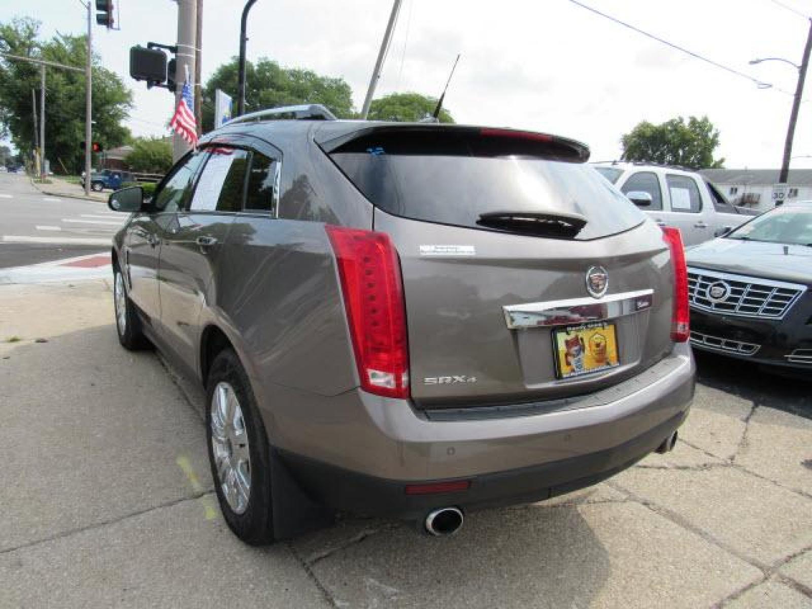 2011 Gold Mist Metallic Cadillac SRX Luxury Collectionn 4WD (3GYFNDEY9BS) with an 3.0 6 Cylinder Fuel Injected engine, 6-Speed Shiftable Automatic transmission, located at 5505 N. Summit St., Toledo, OH, 43611, (419) 729-2688, 41.654953, -83.530014 - Photo #22