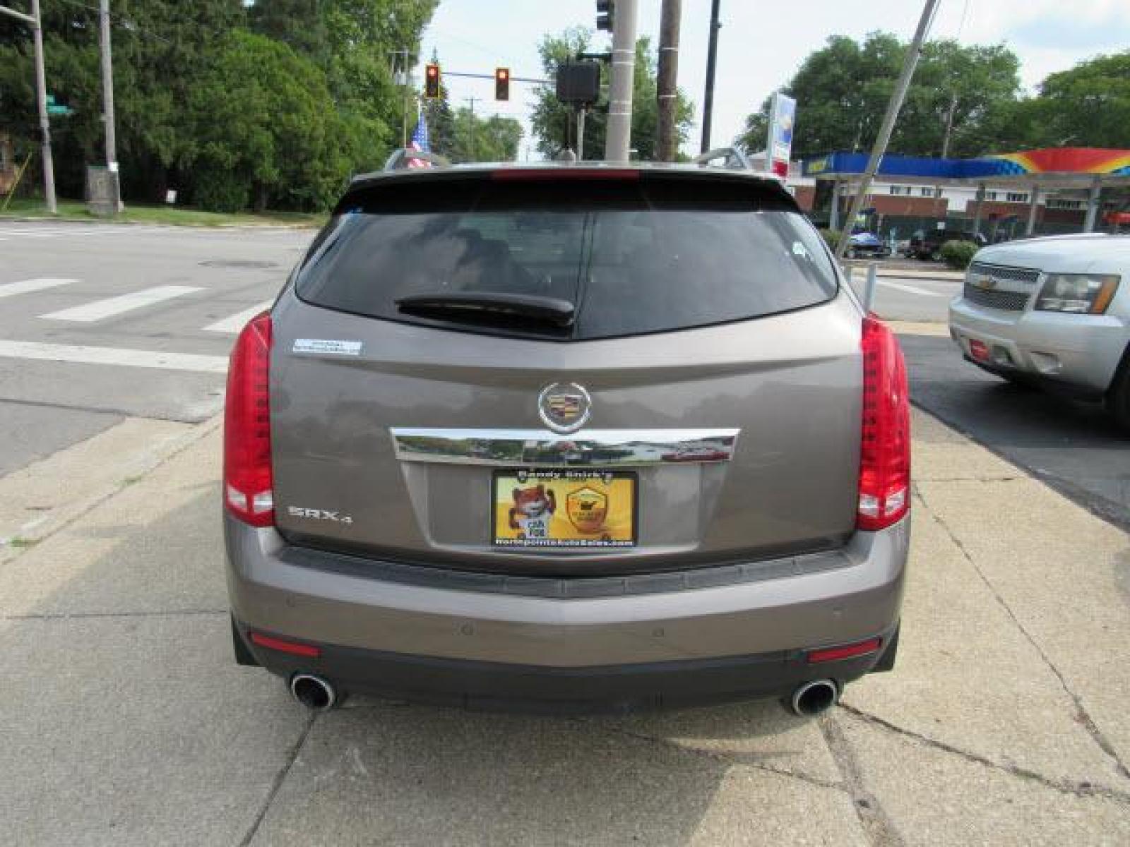 2011 Gold Mist Metallic Cadillac SRX Luxury Collectionn 4WD (3GYFNDEY9BS) with an 3.0 6 Cylinder Fuel Injected engine, 6-Speed Shiftable Automatic transmission, located at 5505 N. Summit St., Toledo, OH, 43611, (419) 729-2688, 41.654953, -83.530014 - Photo #23